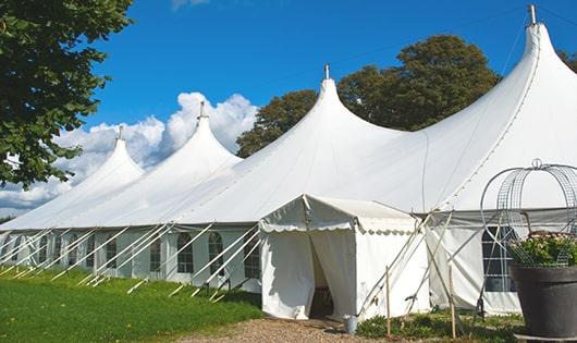 high-quality portable toilets stationed at a wedding, meeting the needs of guests throughout the outdoor reception in Kent